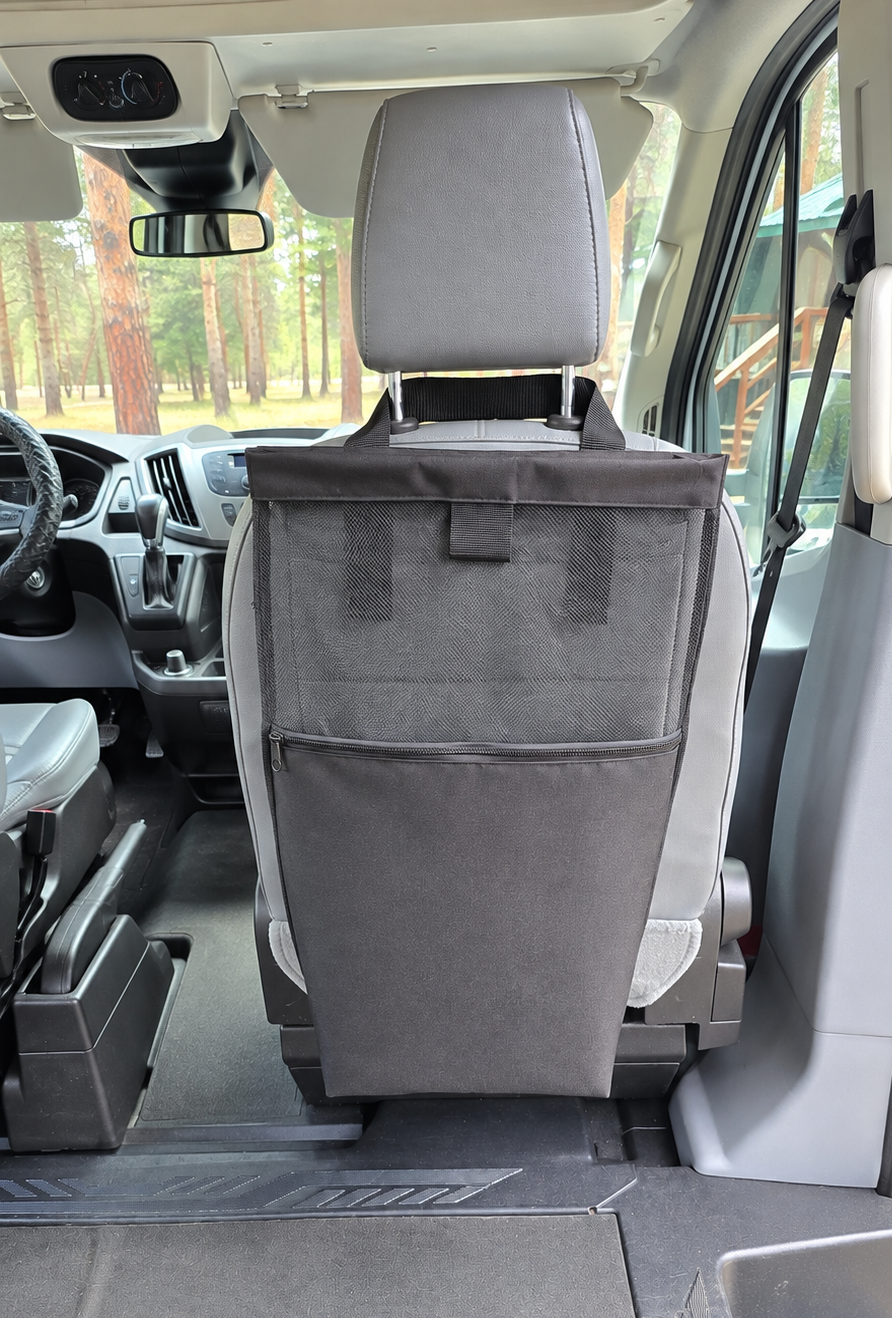 A black seatback mesh laundry bag